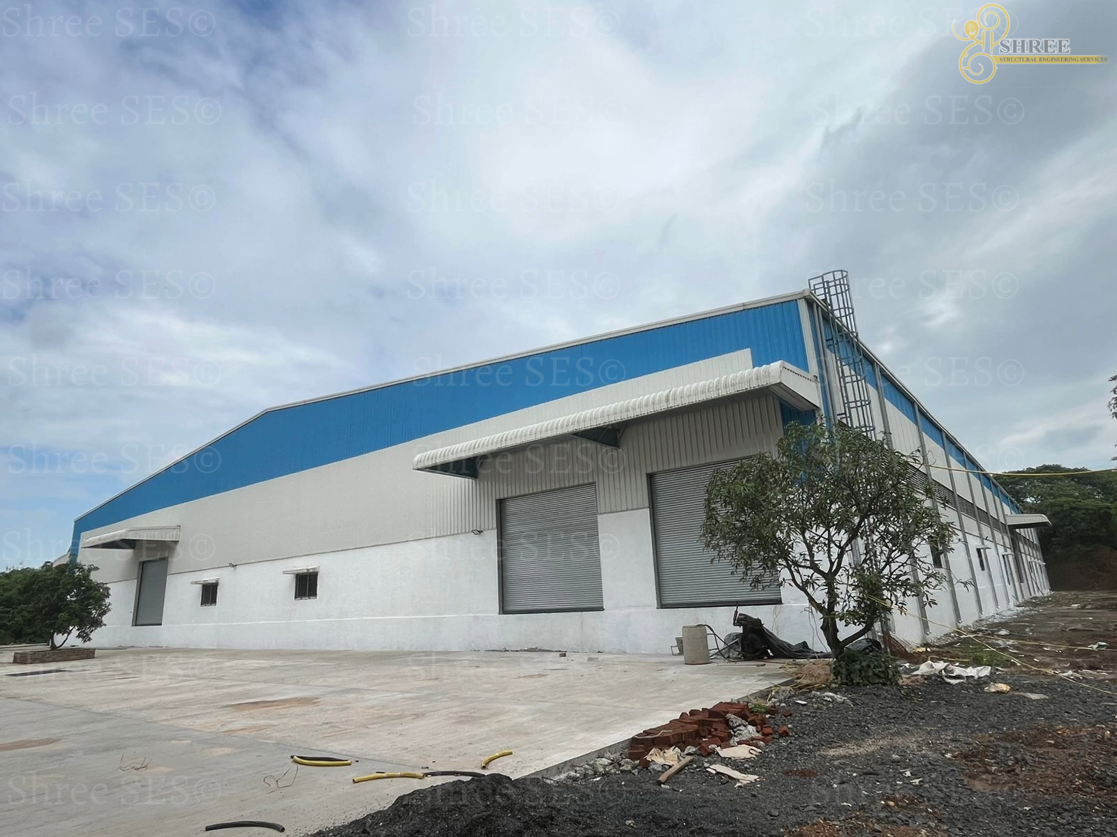 100,000 sq ft Delivered with Zero Errors & 100% Satisfaction Completed 100,000 sq ft PEB warehouse shed near Surat, showcasing zero-error steel erection and 100% structural integrity.